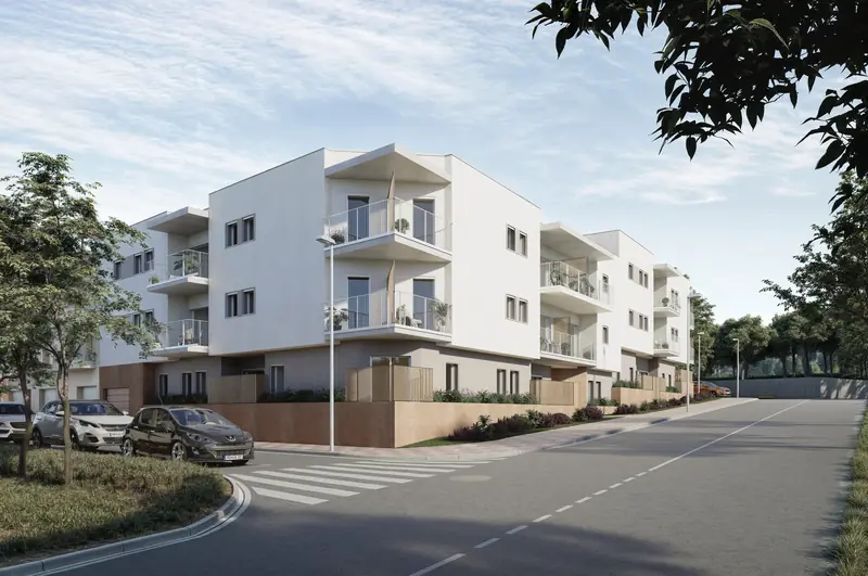 Vista de les façanes exteriors de la promoció amb els accessos